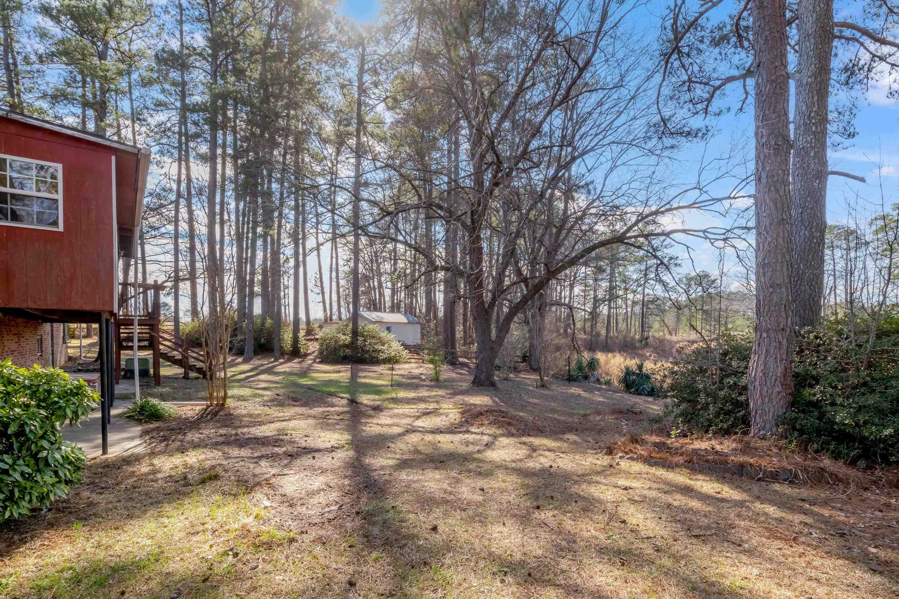 4612 Browns Pond Road Selma, NC 27576 - Photo 48 of 50 a view of a house with yard and sitting area