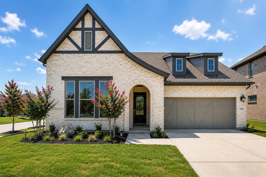 2813 Trinity Ridge Street Mansfield, TX 76063 - Photo 1 of 27 Cream brick exterior with dark trim accents, a prominent front gable, and a single-car garage