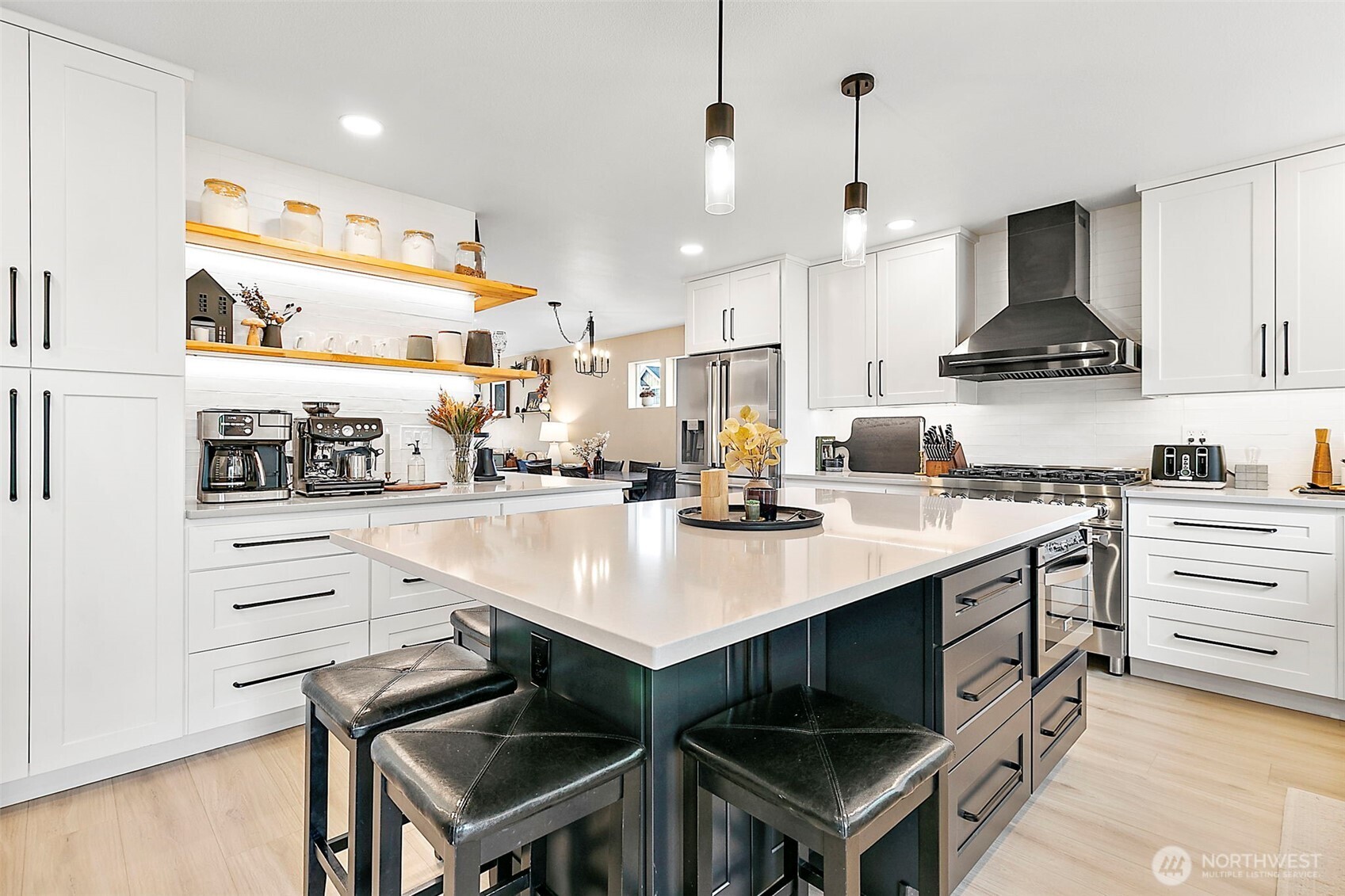 20024 Southeast 260th Place Covington, WA 98042 - Photo 13 of 40 a kitchen with a sink stove and table