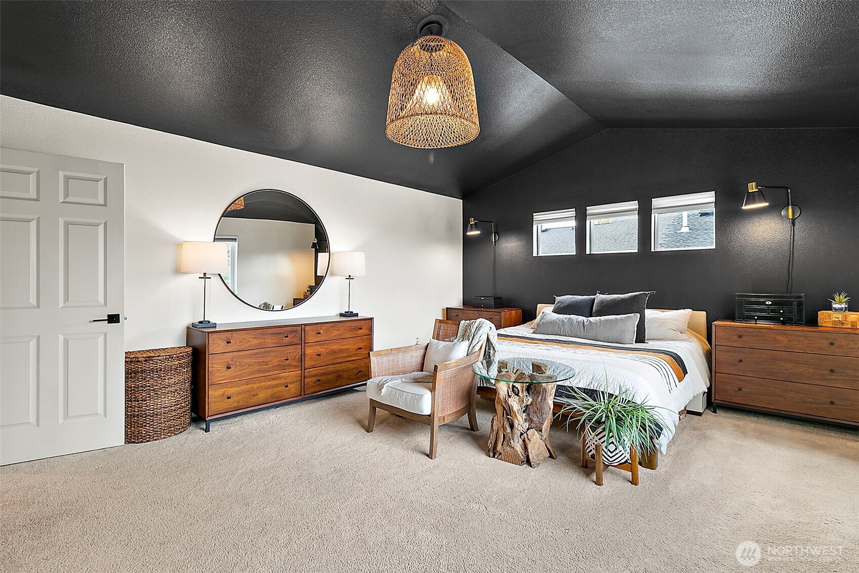 20024 Southeast 260th Place Covington, WA 98042 - Photo 25 of 40 a bedroom with bed and a chandelier