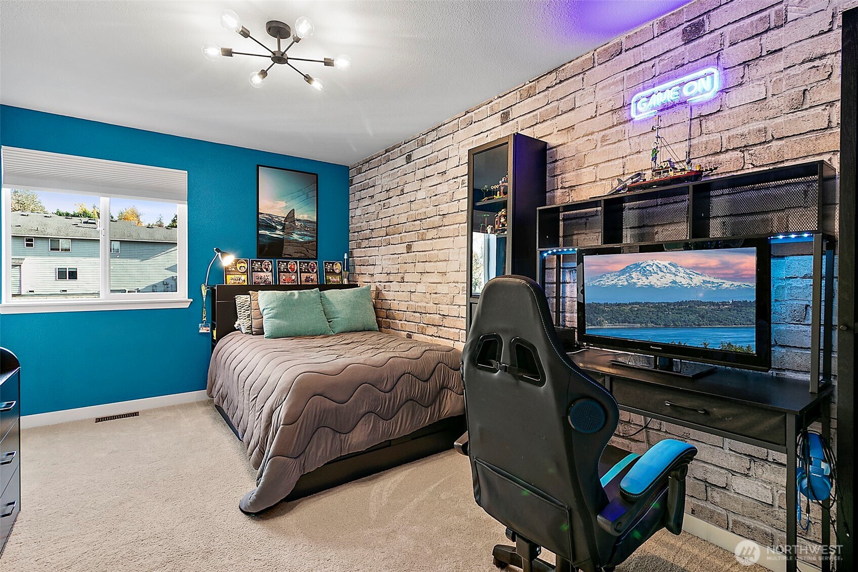 20024 Southeast 260th Place Covington, WA 98042 - Photo 29 of 40 a bedroom with furniture and a flat screen tv