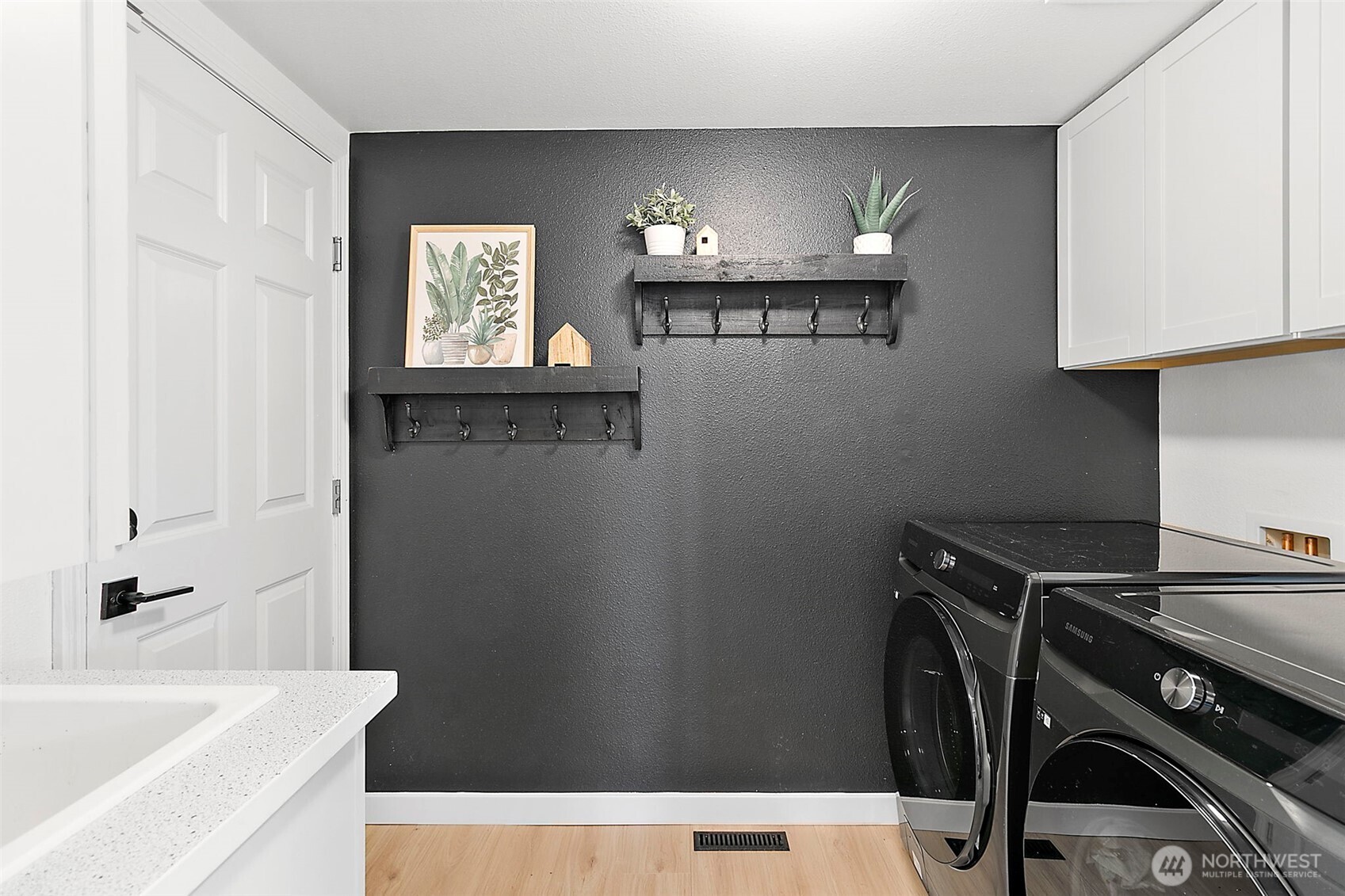 20024 Southeast 260th Place Covington, WA 98042 - Photo 35 of 40 a bathroom with a bathtub a sink and a window