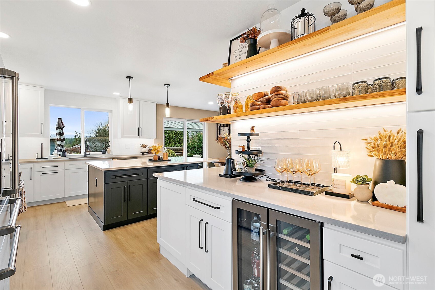 20024 Southeast 260th Place Covington, WA 98042 - Photo 10 of 40 a kitchen with a sink cabinets and appliances