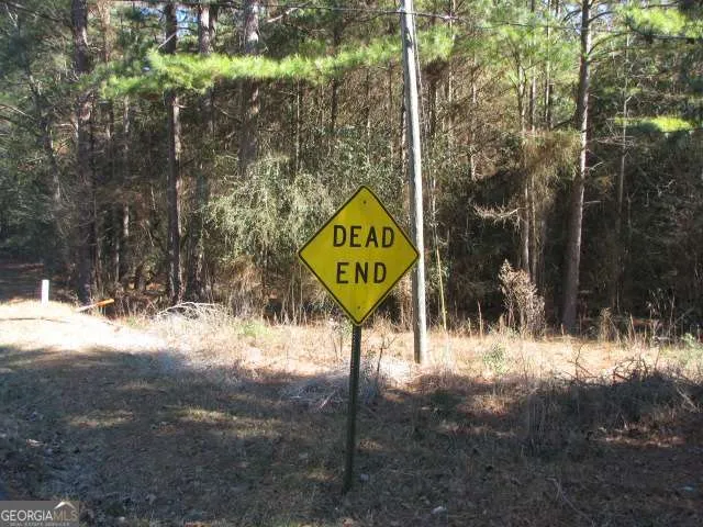 a sign that is on the side of a road