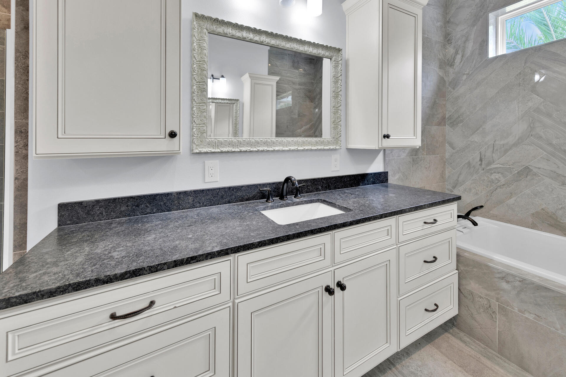 617 Churchill Bayou Road Santa Rosa Beach, FL 32459 - Photo 36 of 67 a bathroom with a sink and a mirror