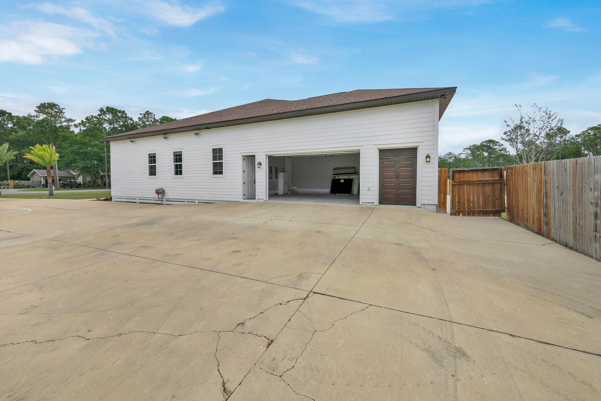 617 Churchill Bayou Road Santa Rosa Beach, FL 32459 - Photo 58 of 67 a view of a house with a garage