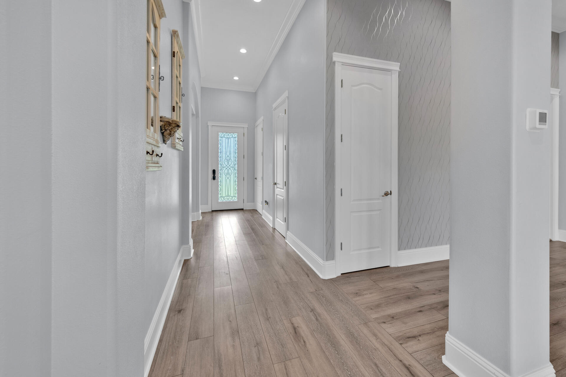 617 Churchill Bayou Road Santa Rosa Beach, FL 32459 - Photo 8 of 67 a view of a hallway with wooden floor