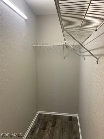 a view of small space with racks on the wall