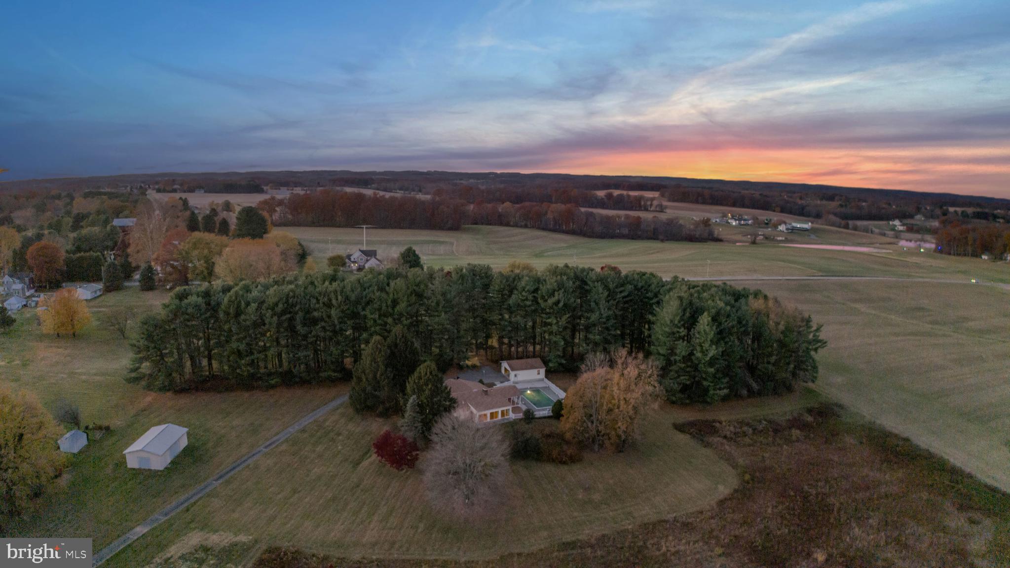 3116 Mt Carmel Road Upperco, MD 21155 - Photo 1 of 28 an aerial view of a house with a yard