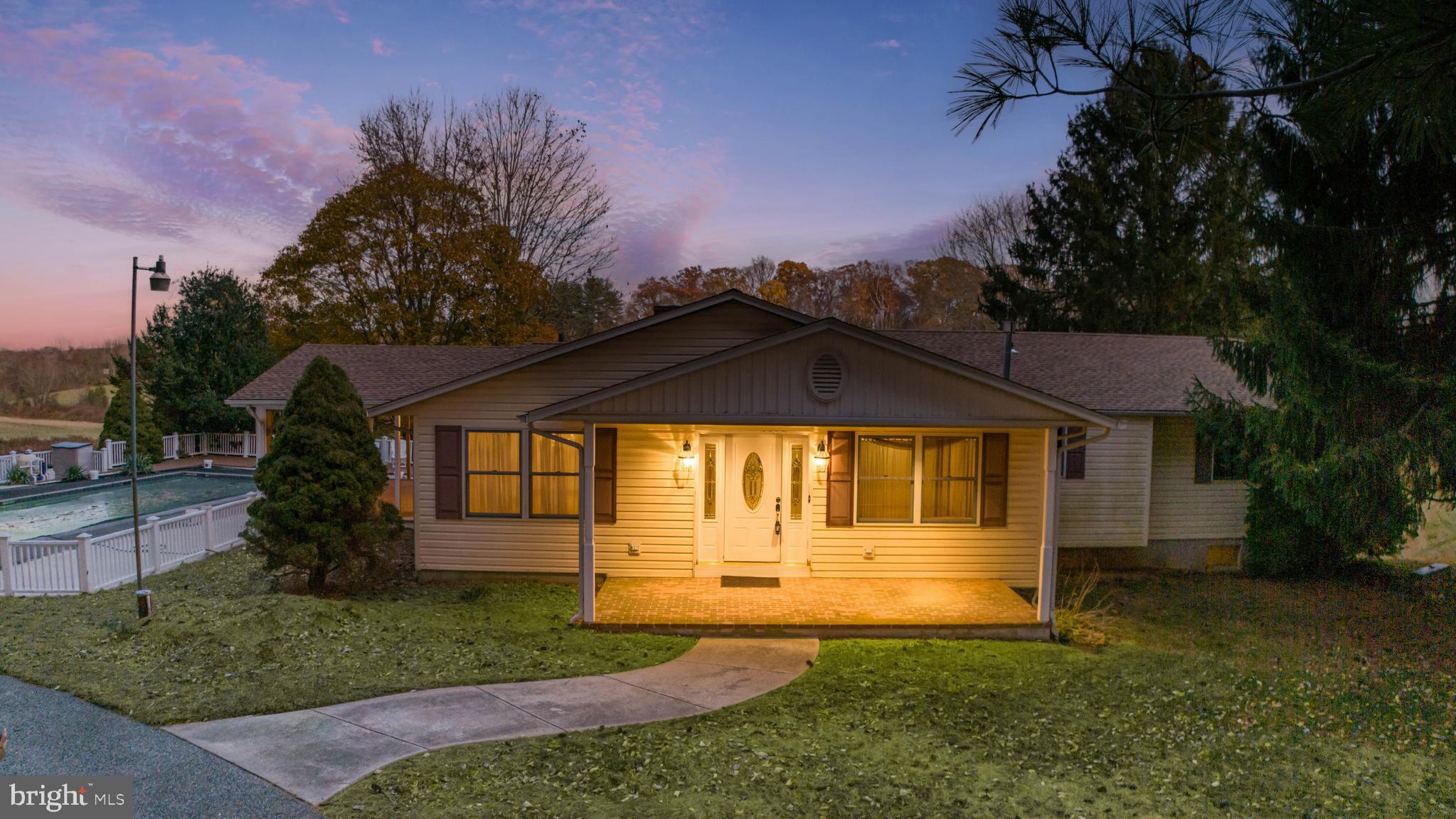 3116 Mt Carmel Road Upperco, MD 21155 - Photo 28 of 28 a front view of a house with a yard