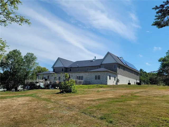a view of a house with a swimming pool