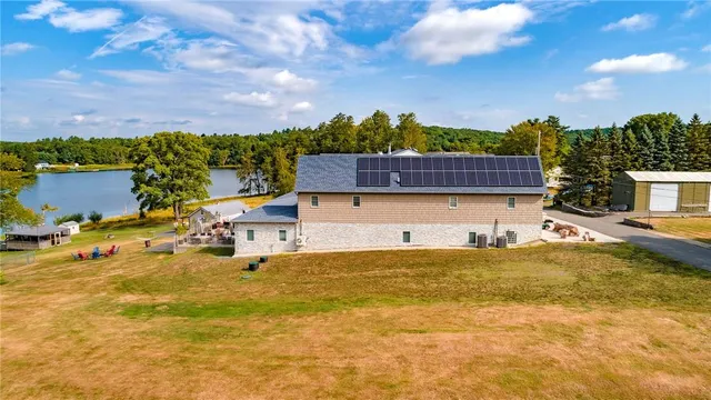 a swimming pool view with a lake view