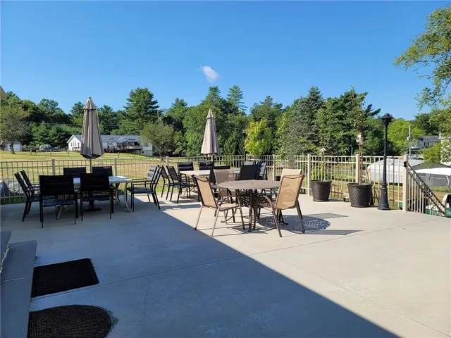 a view of outdoor space with barbecue grill and outdoor seating