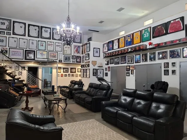 a room with lots of furniture and clutter