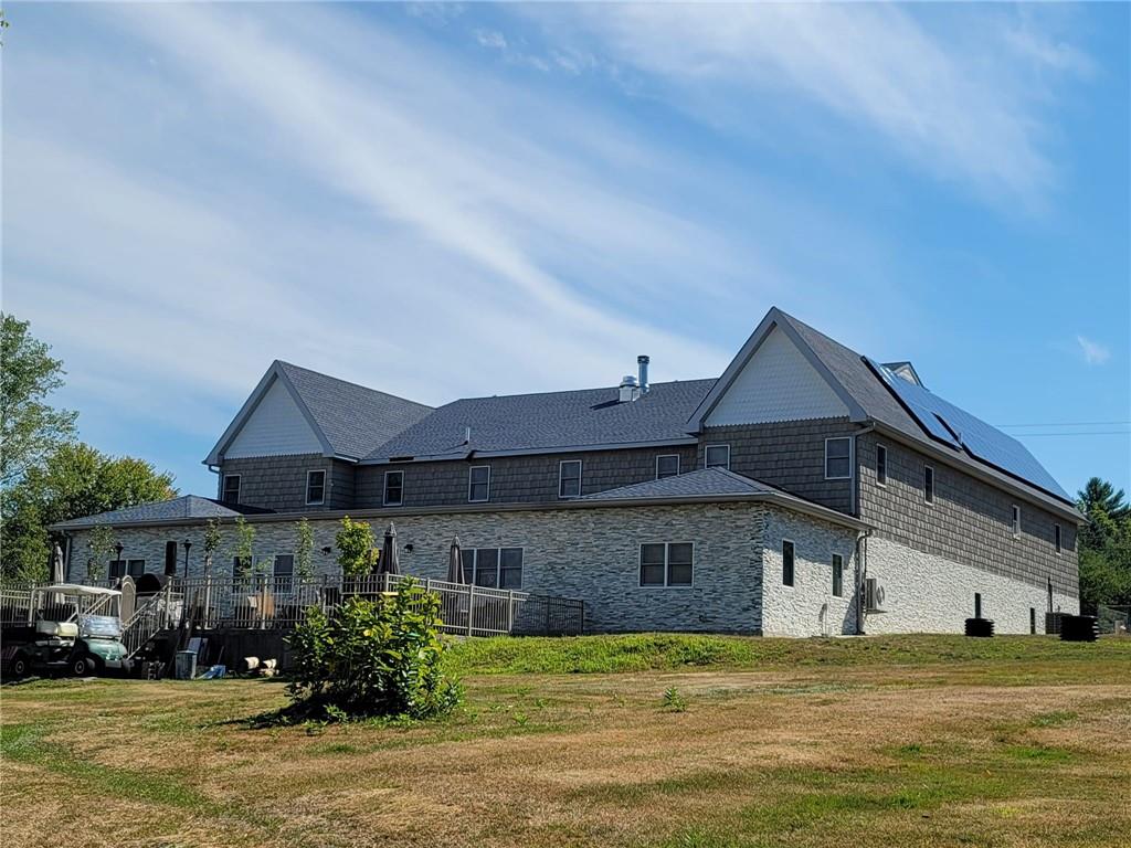 35 Washington Lake Road Eldred, NY 12732 - Photo 2 of 35 a front view of a house with a garden and yard