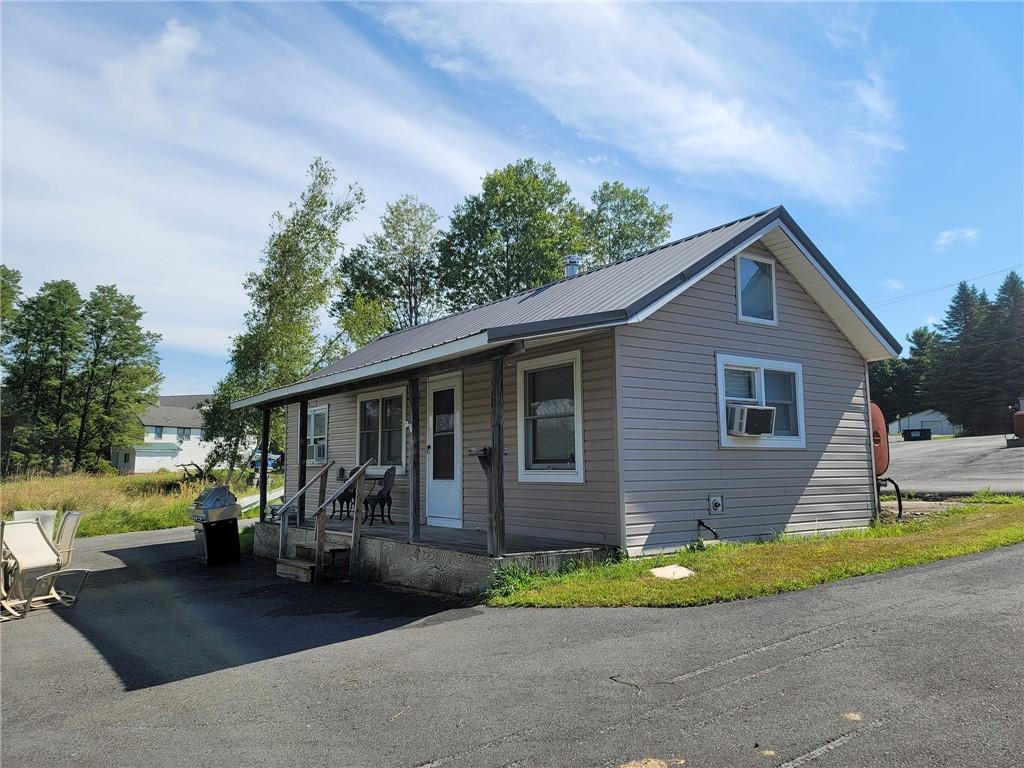 35 Washington Lake Road Eldred, NY 12732 - Photo 28 of 35 a front view of a house with garden
