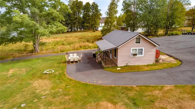 a view of a house with a swimming pool