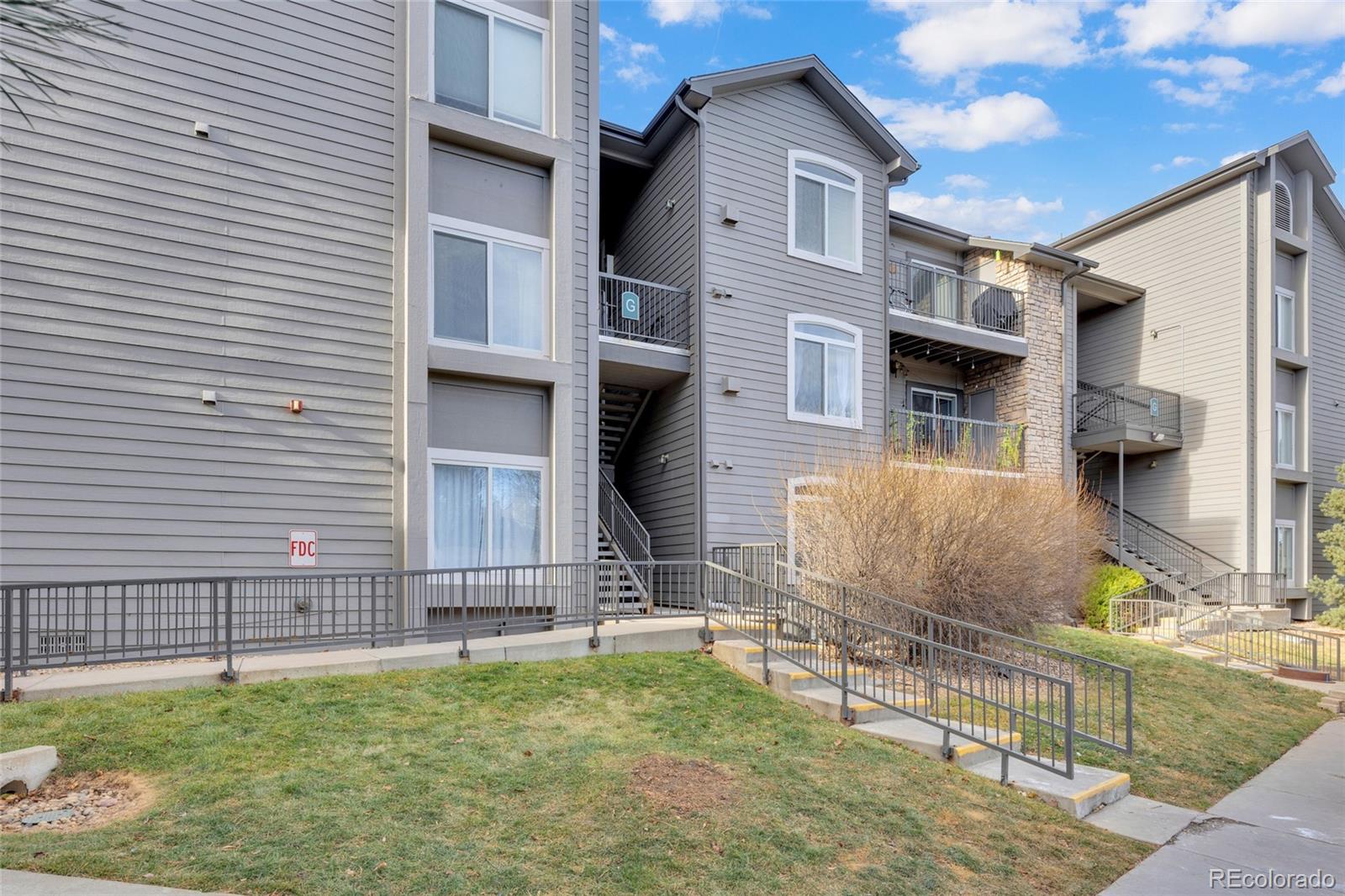 2575 South Syracuse Way, Unit G104 Denver, CO 80231 - Photo 19 of 20 a house view with a outdoor space