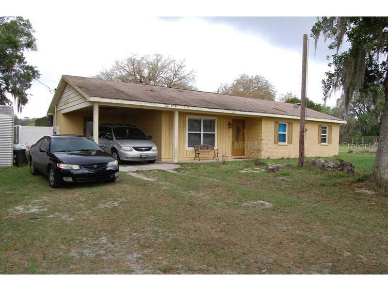 9752 Curley Road Zephyrhills, FL 33545 - Photo 1 of 1 Exterior Front
