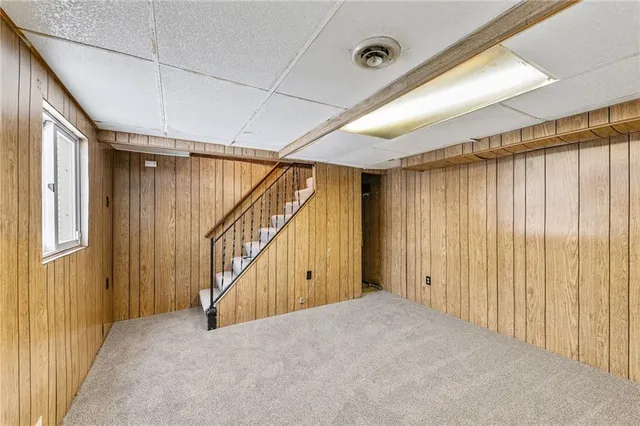 a view of entryway with stairs