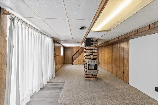 a view of empty room with windows