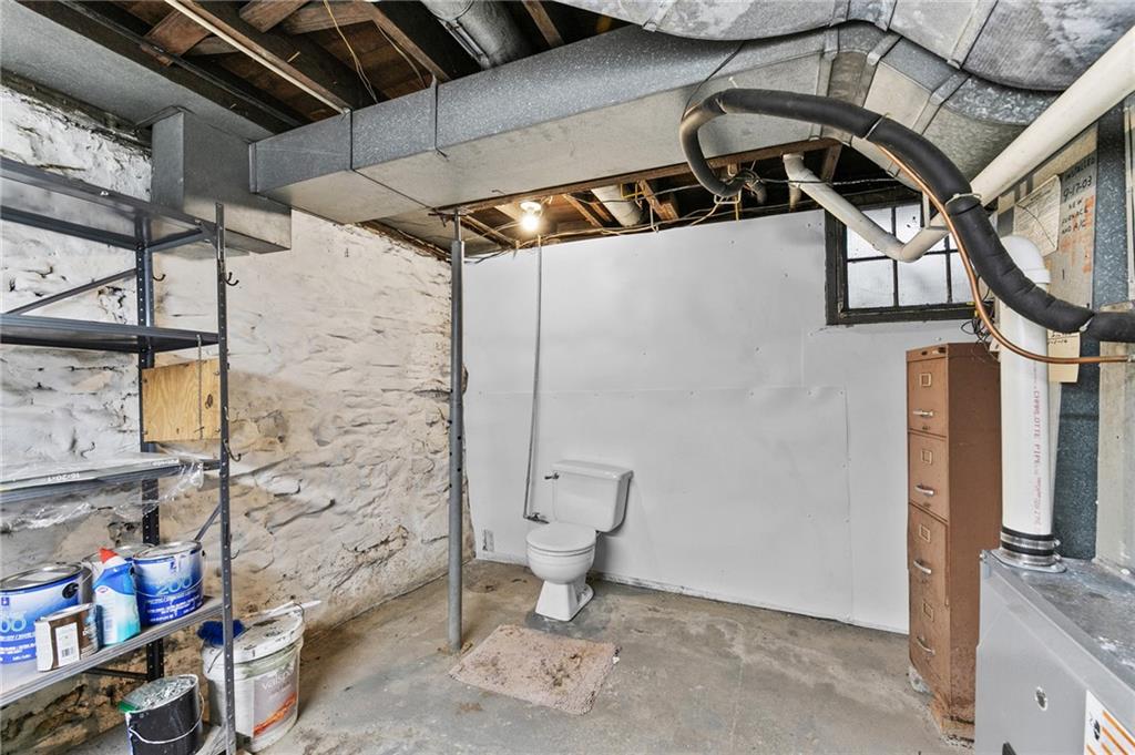 807 Oak Street Monessen, PA 15062 - Photo 22 of 28 a bathroom with a toilet and a shower