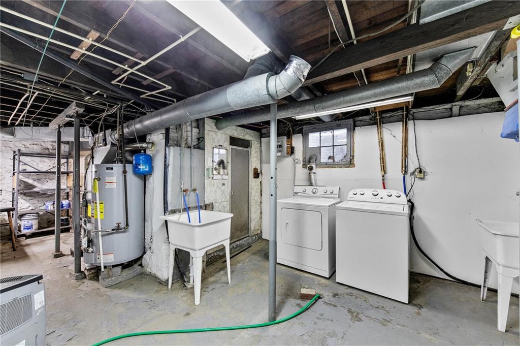 807 Oak Street Monessen, PA 15062 - Photo 23 of 28 a utility room with dryer and washer