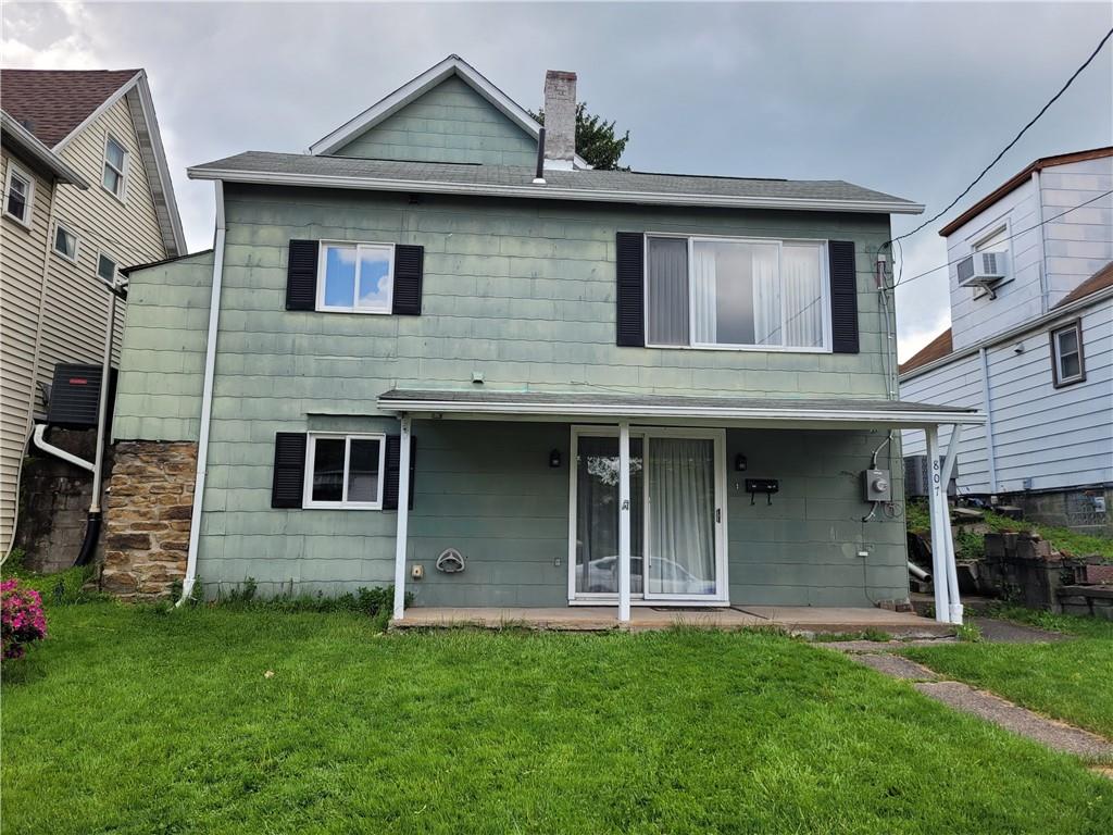 807 Oak Street Monessen, PA 15062 - Photo 3 of 28 a view of a house with a yard
