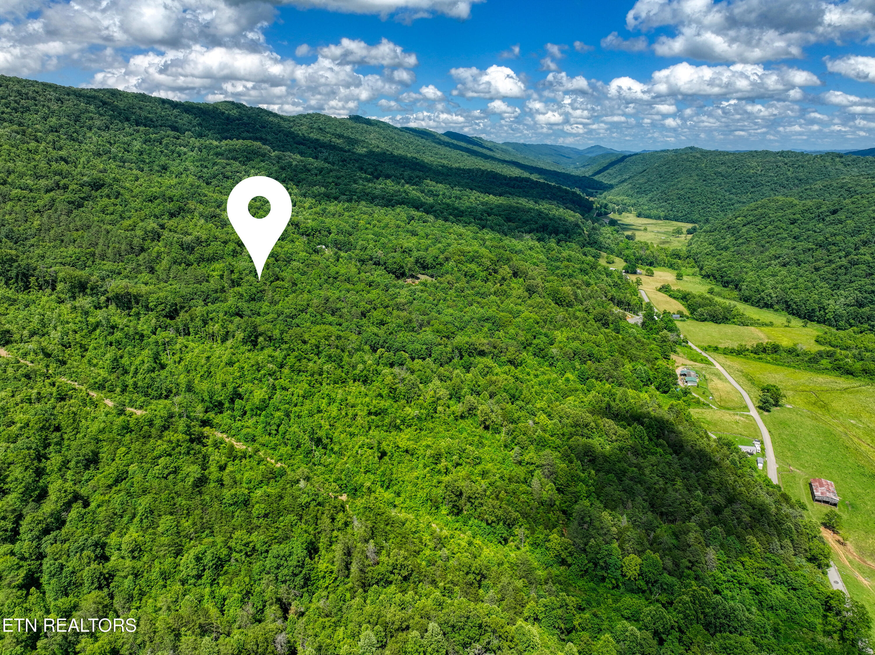 Black Water Road Sneedville, TN 37869 - Photo 4 of 11 DJI_20250617152932_0199_D_97