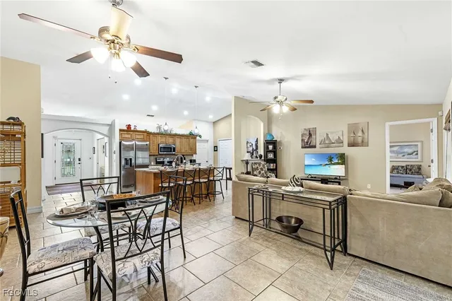a view of a dining room kitchen and a window
