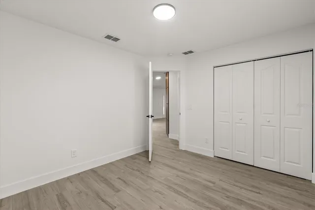 a bathroom with a sink a mirror and shower