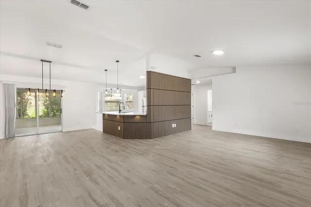 a view of kitchen with furniture and window
