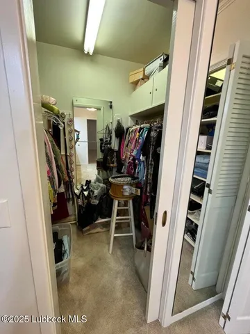 a bed room with a bed and a window