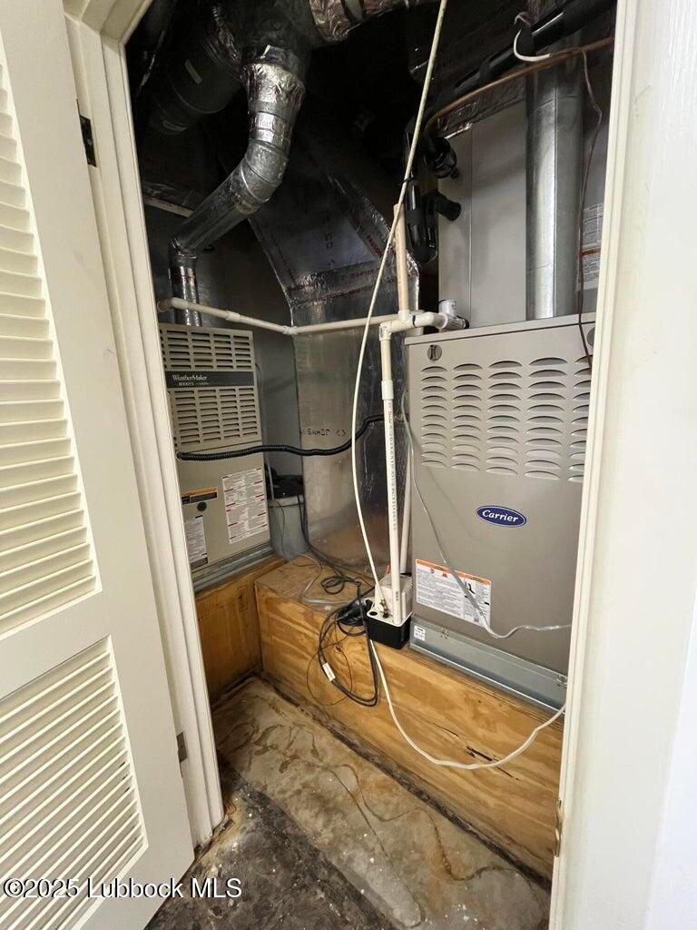 103 Yucca Terrace Plainview, TX 79072 - Photo 33 of 79 a view of a room with wooden floor