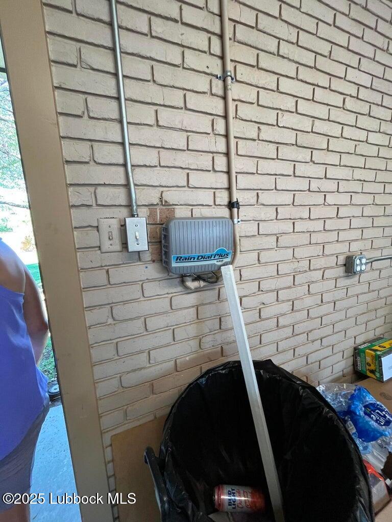 103 Yucca Terrace Plainview, TX 79072 - Photo 73 of 79 a bathroom with a sink and a shower