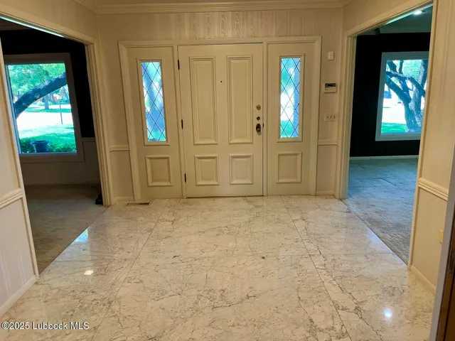 a view of a livingroom with furniture window and outside view