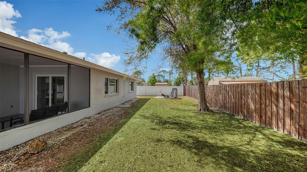 972 Leeward Road Venice, FL 34293 - Photo 24 of 27 a view of a back yard of the house