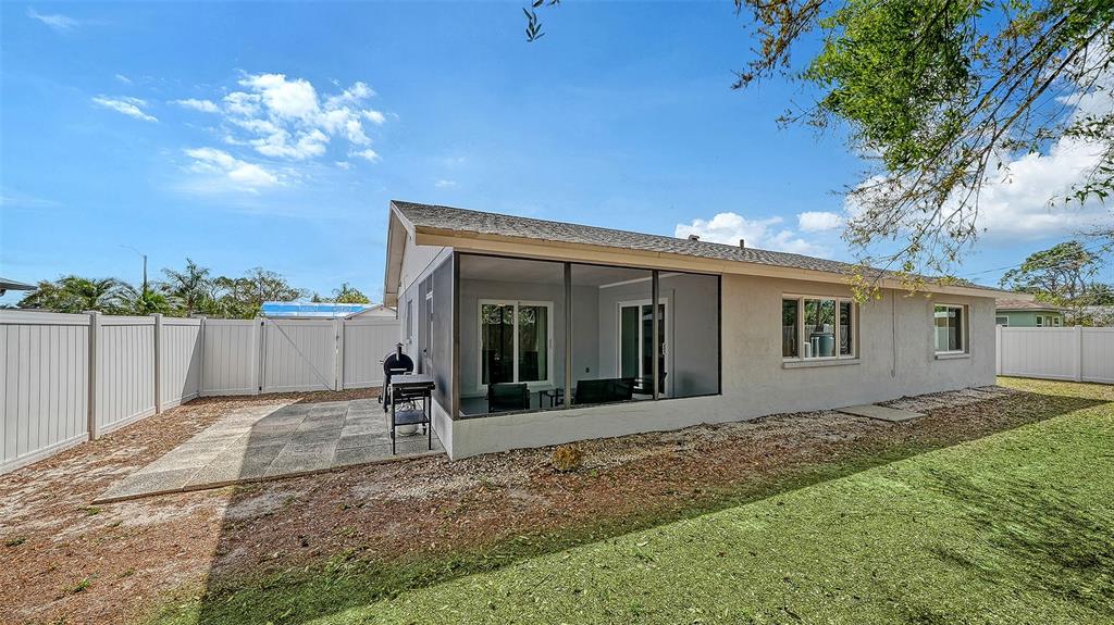 972 Leeward Road Venice, FL 34293 - Photo 25 of 27 a view of a house with a patio