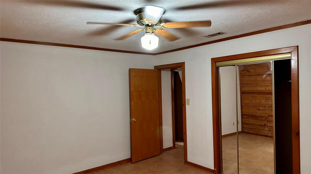 126 Garza Road Shady Shores, TX 76208 - Photo 7 of 19 a view of a livingroom with a ceiling fan and a chandelier fan