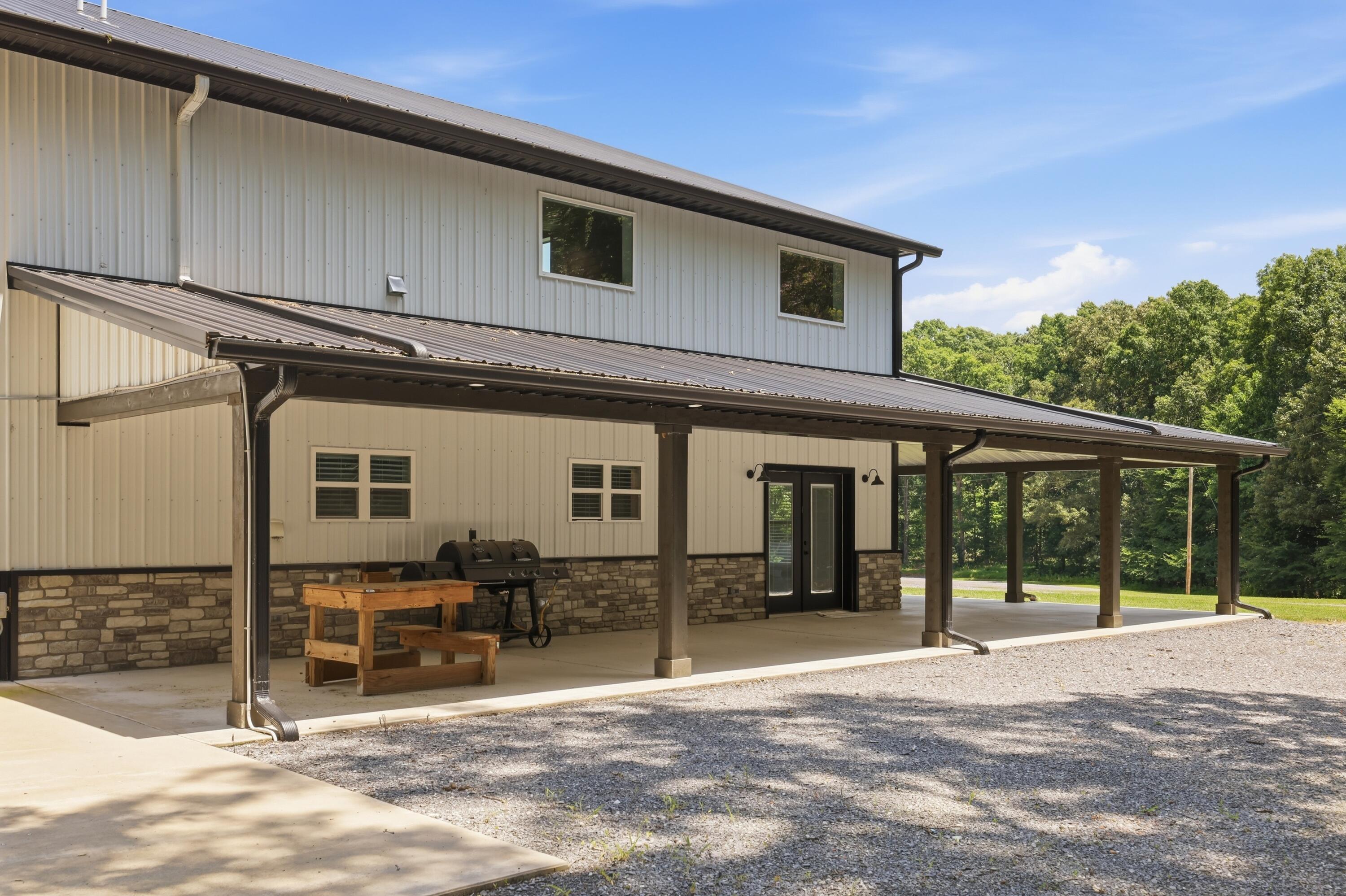5279 State Line Road East Hazel, KY 42049 - Photo 47 of 93 Beautiful Wrap Around Porch on Home Portion