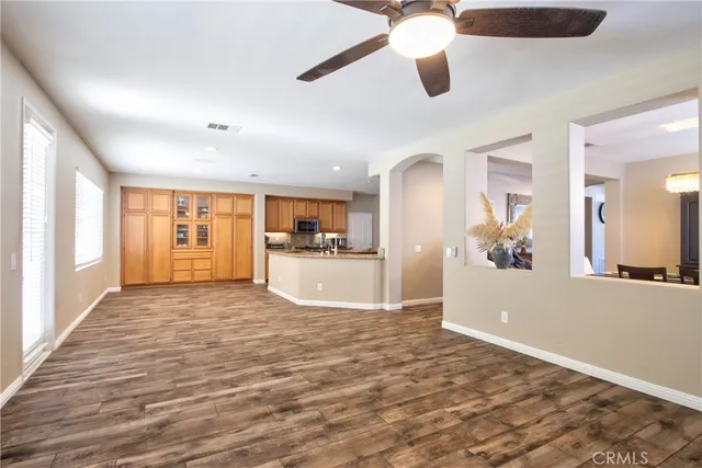 a view of a kitchen with a sink and cabinets