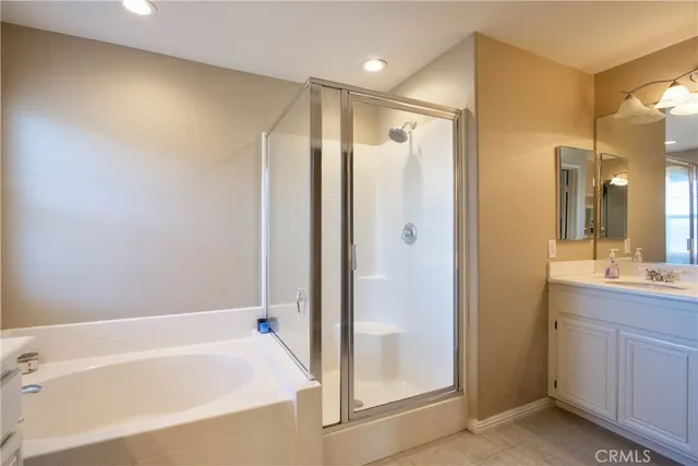 a bathroom with a bathtub and a sink