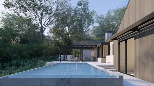 a view of backyard with seating and green space