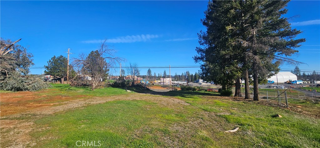 5647 Clark Road Paradise, CA 95969 - Photo 7 of 10 a view of a yard with table and chairs and a fire pit