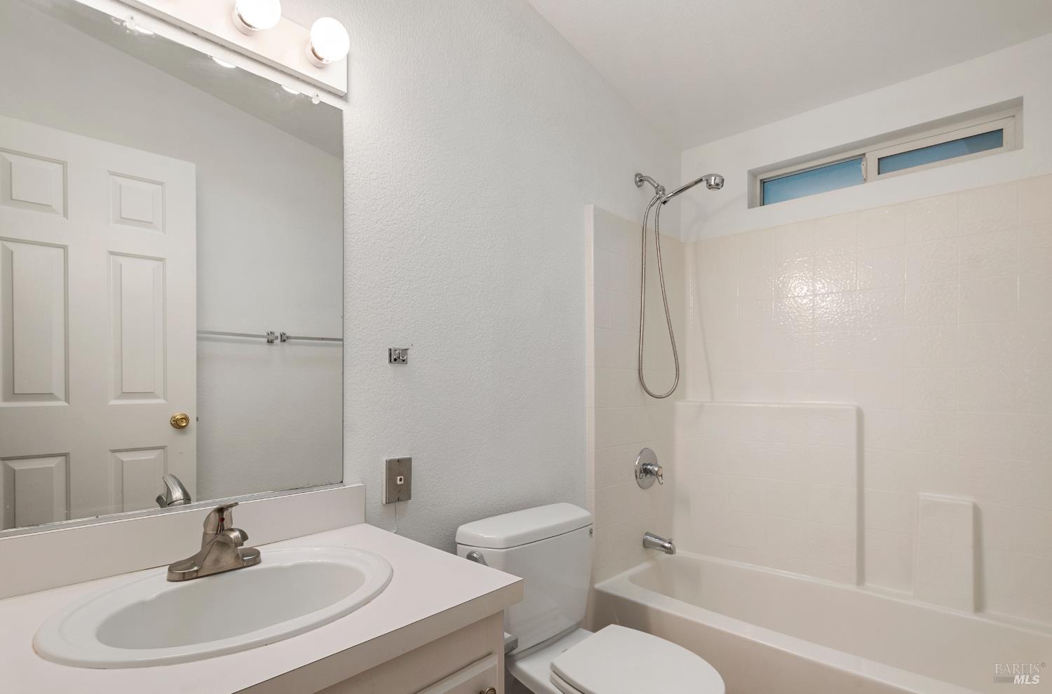 2412 Foothill Boulevard, Unit 41 Calistoga, CA 94515 - Photo 23 of 33 a bathroom with a sink toilet and shower