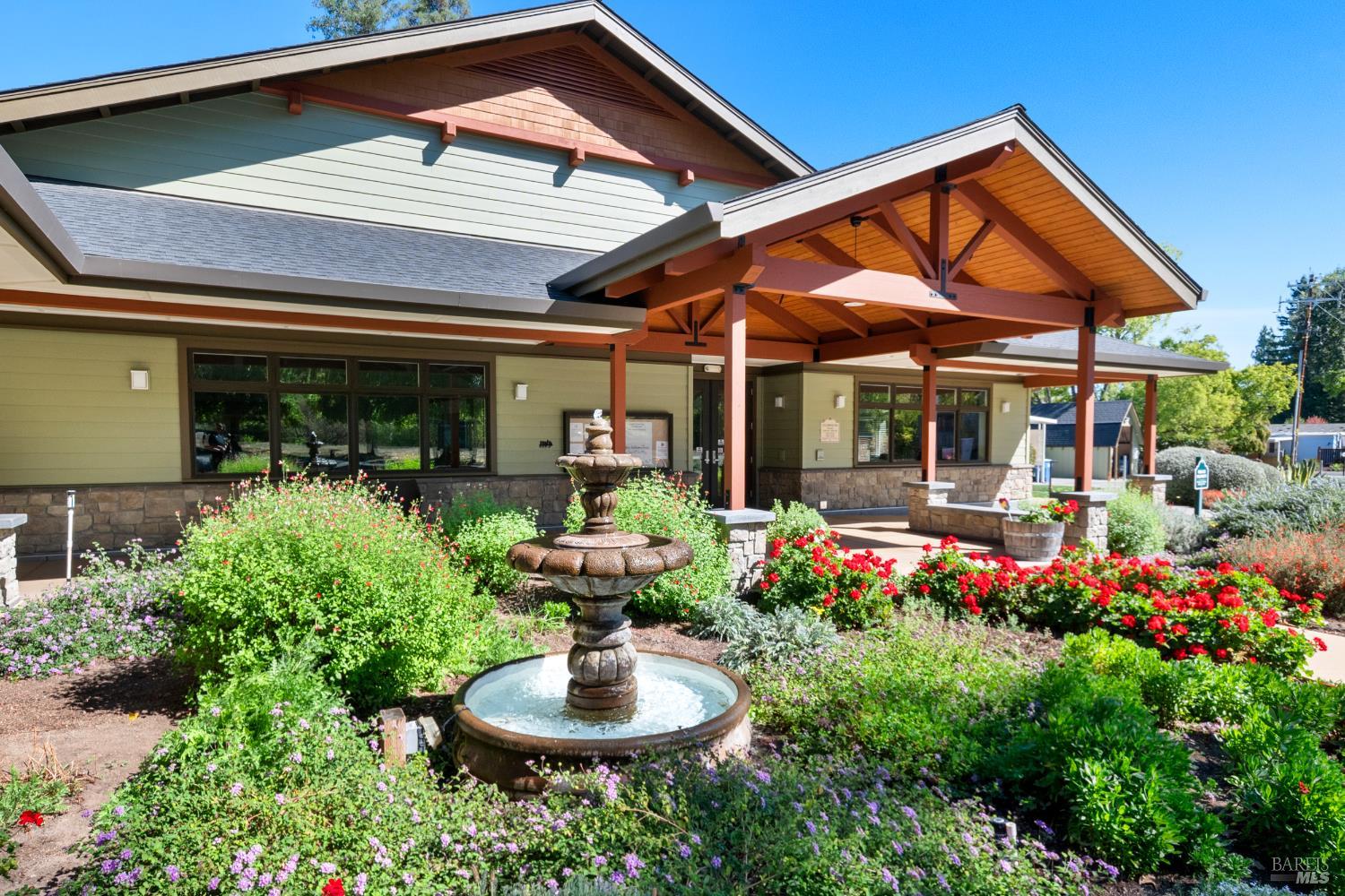 2412 Foothill Boulevard, Unit 41 Calistoga, CA 94515 - Photo 26 of 33 a patio with table and chairs and potted plants