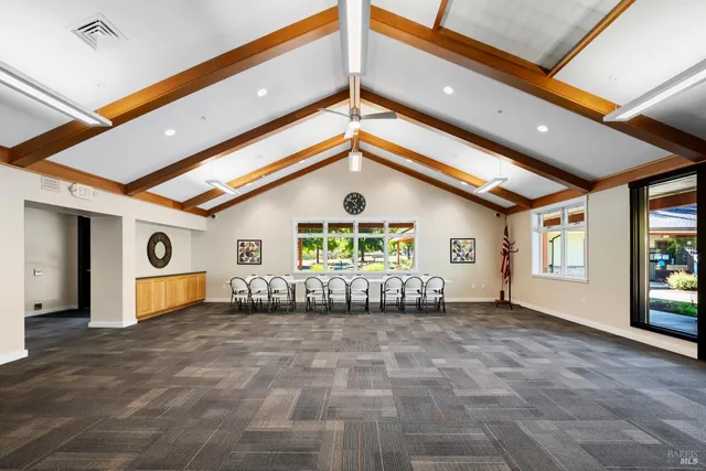 a view of livingroom with window and hardwood floor