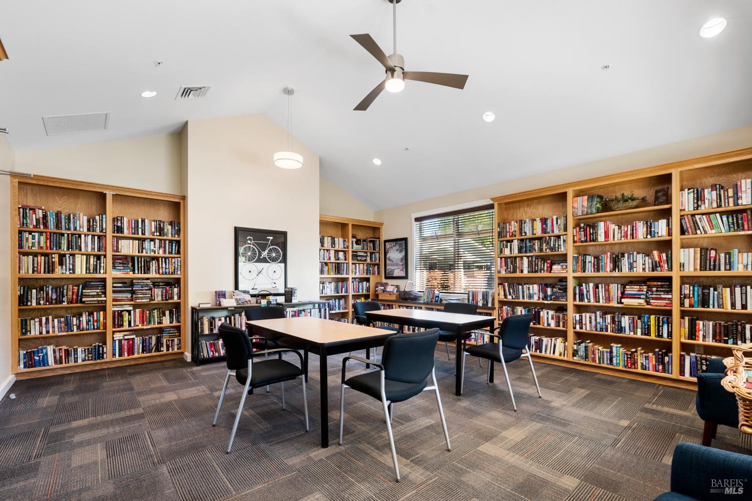 2412 Foothill Boulevard, Unit 41 Calistoga, CA 94515 - Photo 33 of 33 a view of a livingroom with furniture and a bookshelf