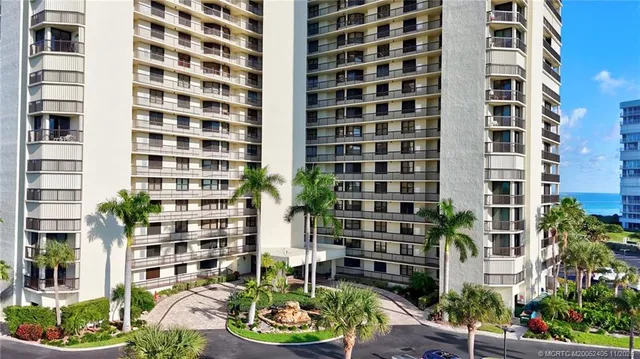 a view of a building with sitting area