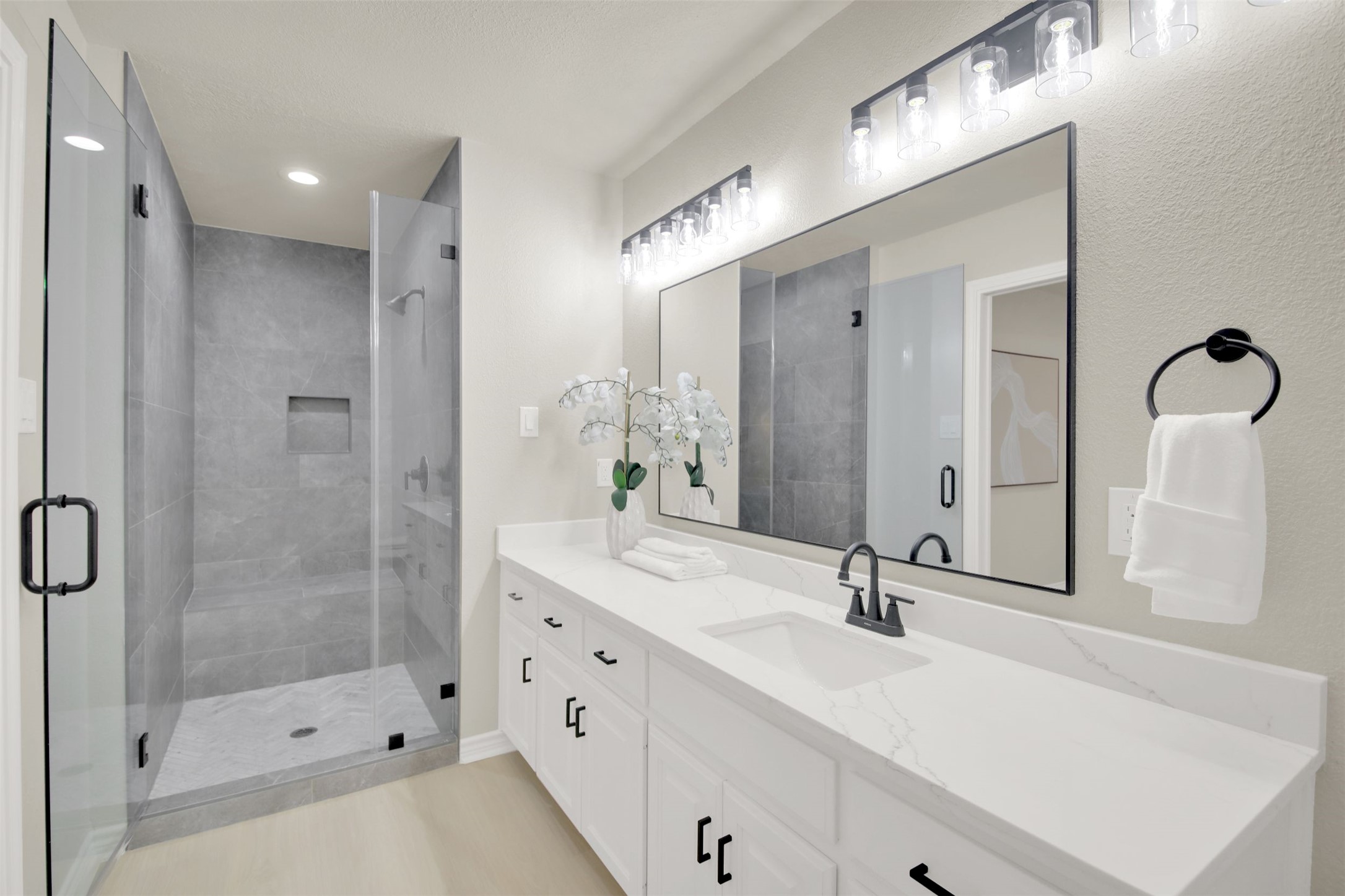 131 Meadow Valley Loop Jarrell, TX 76537 - Photo 20 of 32 Remodeled bath with quartz counters